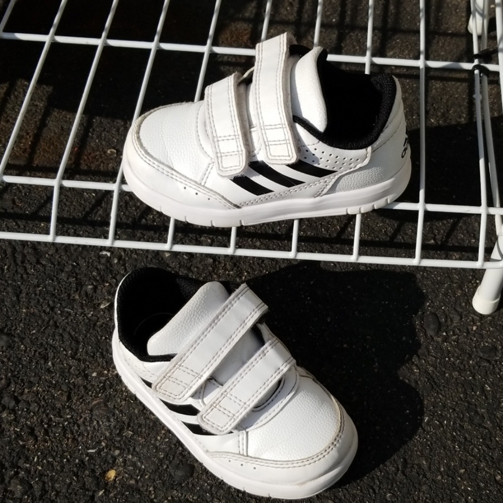 Adidas white sneakers.